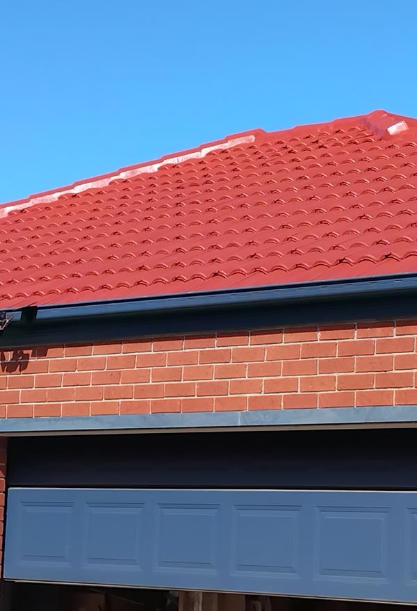 Goshen Roofing carrying out roof restoration work in Melbourne