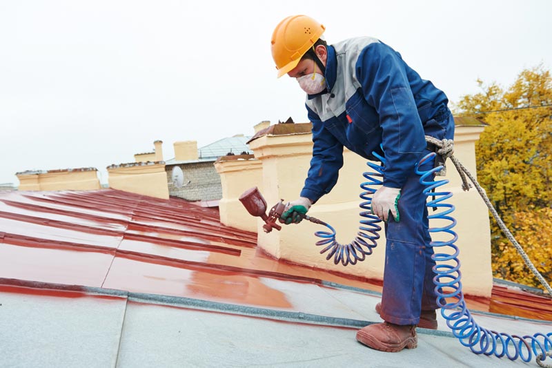 Applying roof coating